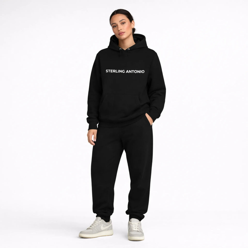 Person wearing a black hoodie with 'STERLING ANTONIO' text on a white background