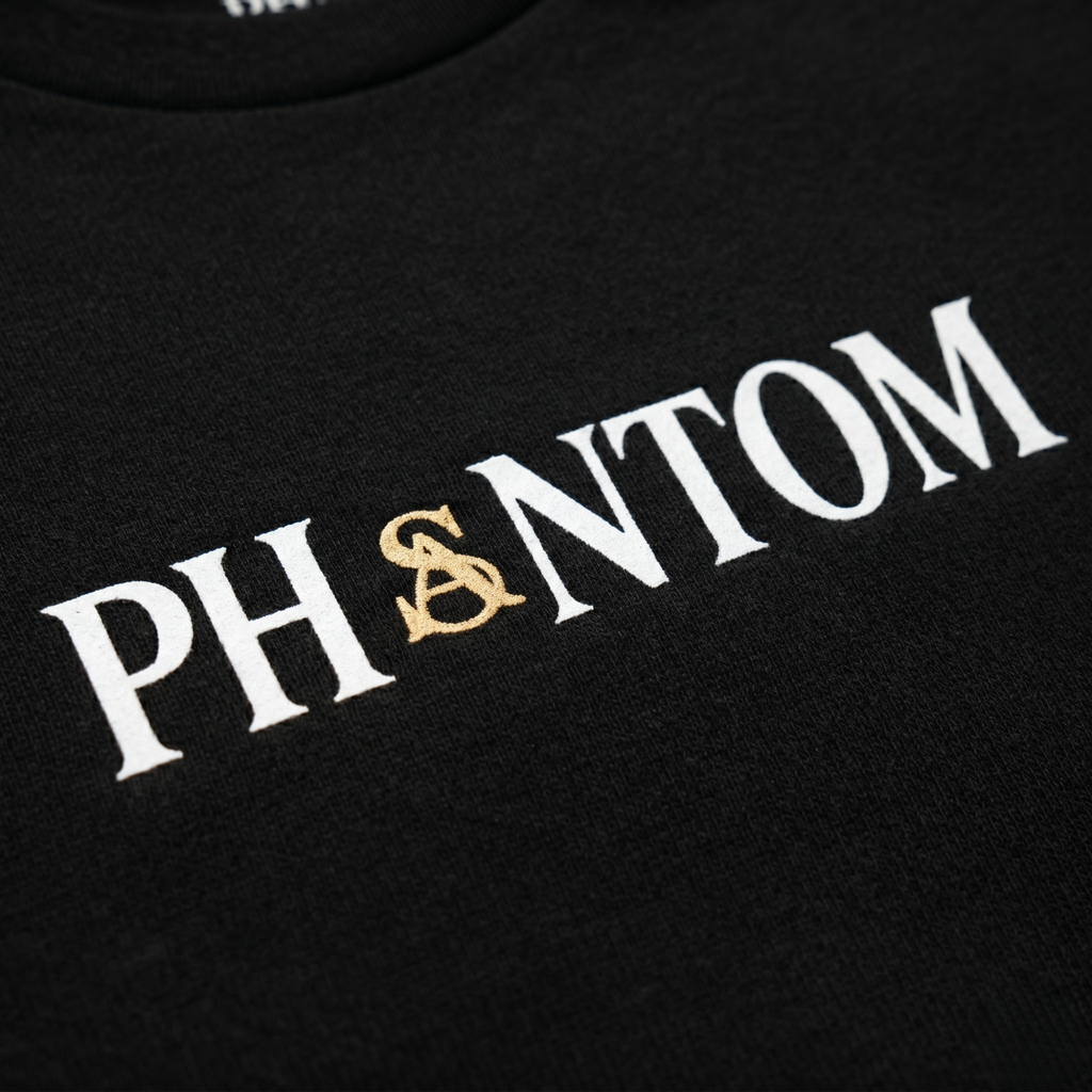 Black shirt with 'PHANTOM' printed in white and gold on a black background