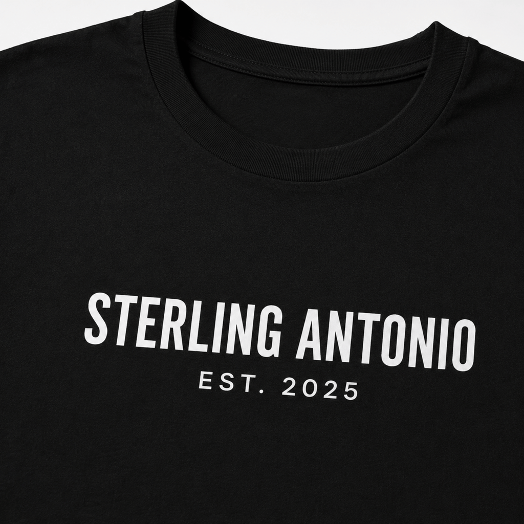 Black t-shirt with 'STERLING ANTONIO EST. 2025' text on a white background