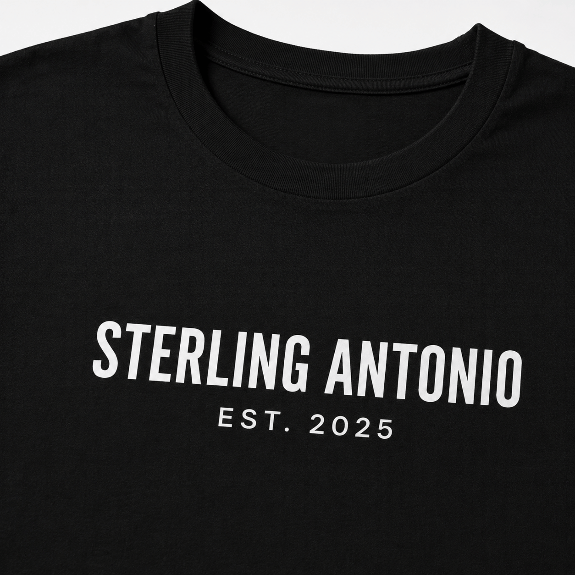 Black t-shirt with 'STERLING ANTONIO EST. 2025' text on a white background