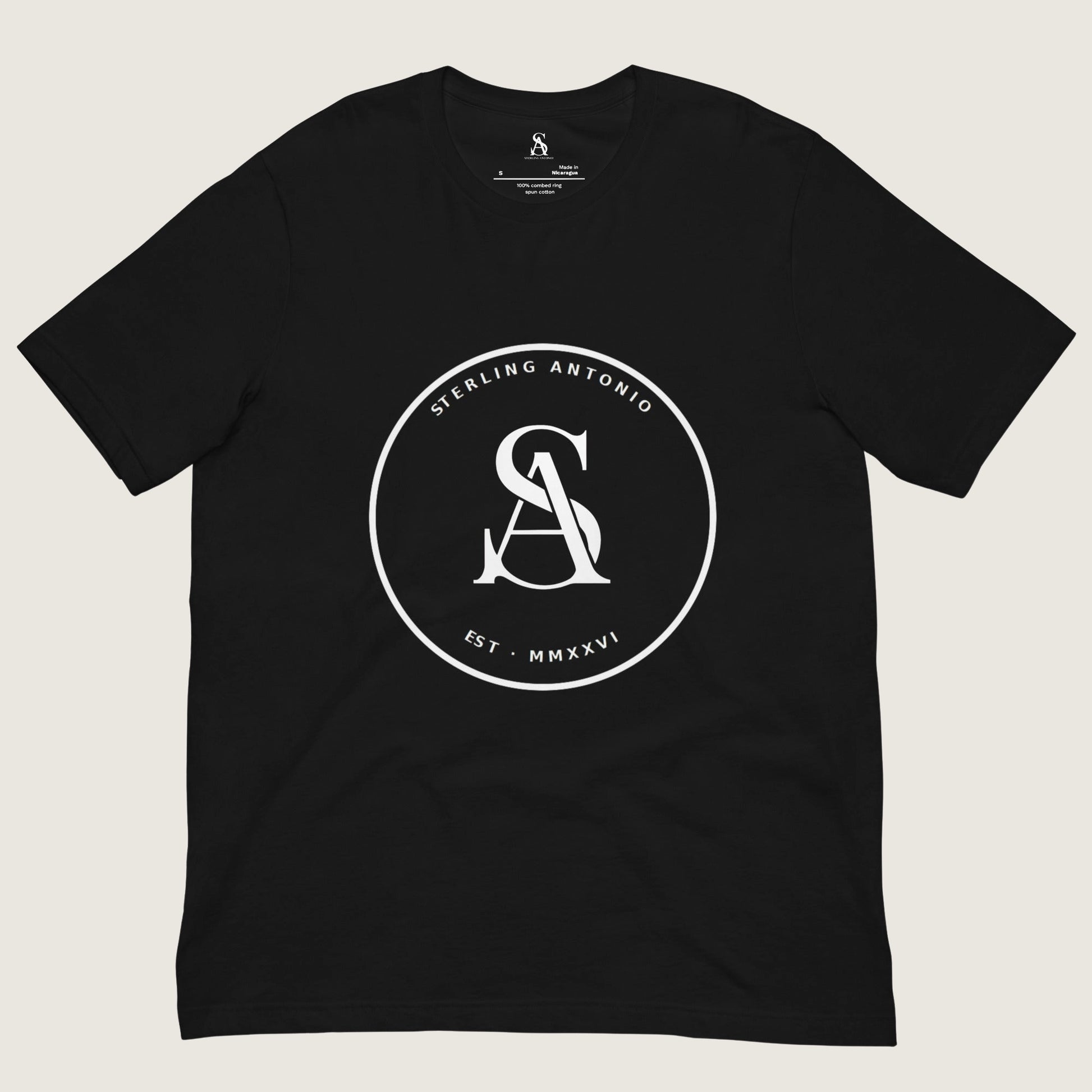 Black t-shirt with a small logo on the chest against a white background