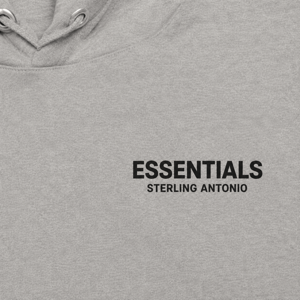 Close-up of Sterling Antonio carbon grey essentials hoodie featuring minimalist black logo print and premium cotton fabric texture