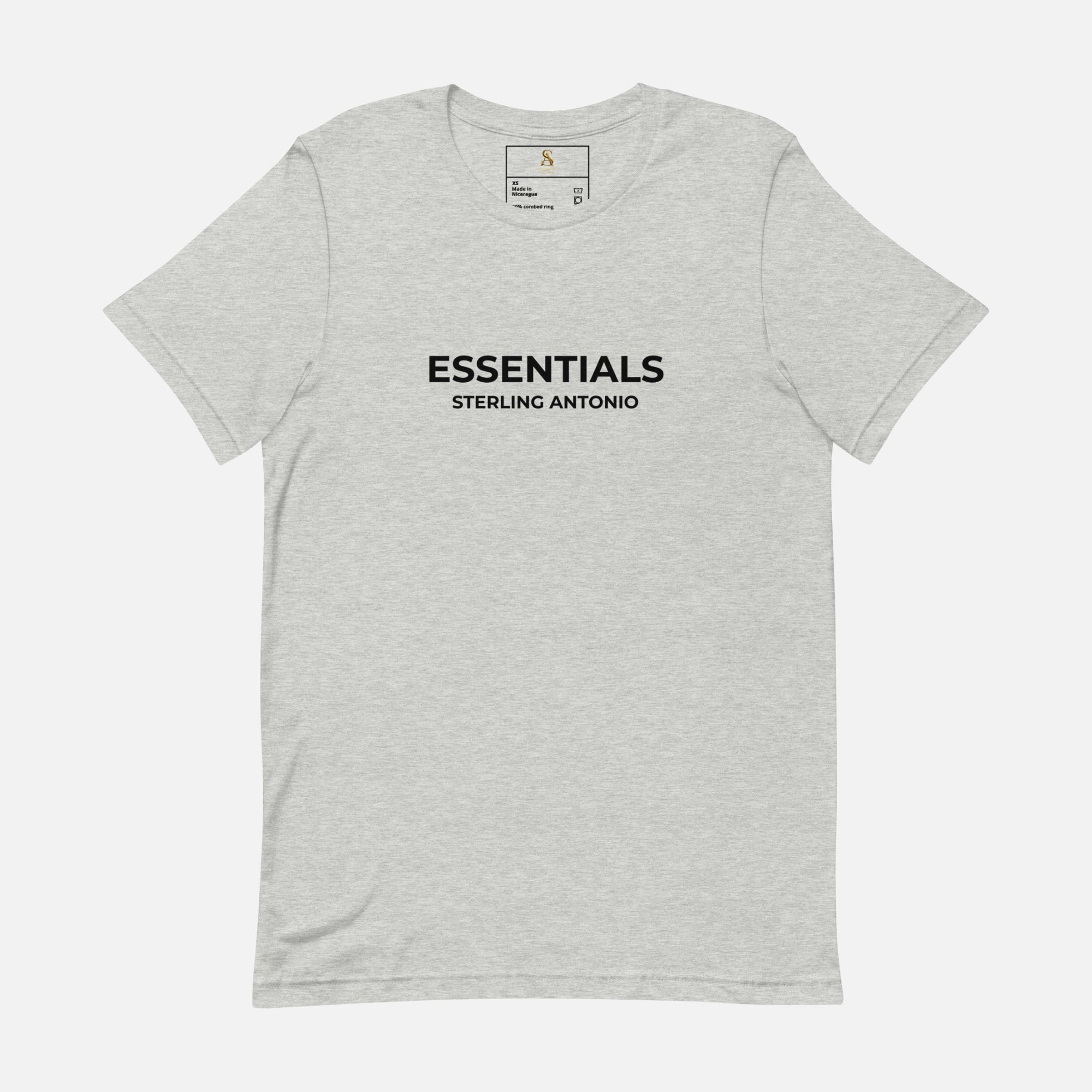 Gray t-shirt with 'ESSENTIALS' and 'STERLING ANTONIO' text on a white background
