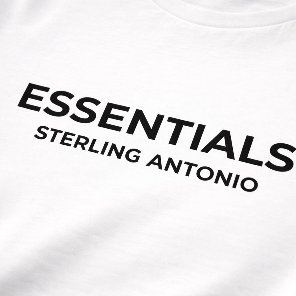 White t-shirt with 'ESSENTIALS STERLING ANTONIO' text in black
