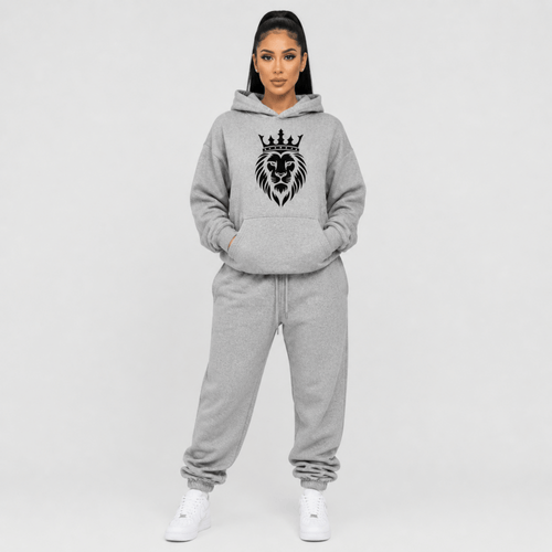 Front view of a person wearing a gray hoodie with a black lion and crown design on a white background