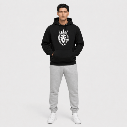 Front view of person wearing a black hoodie and gray sweatpants on a white background