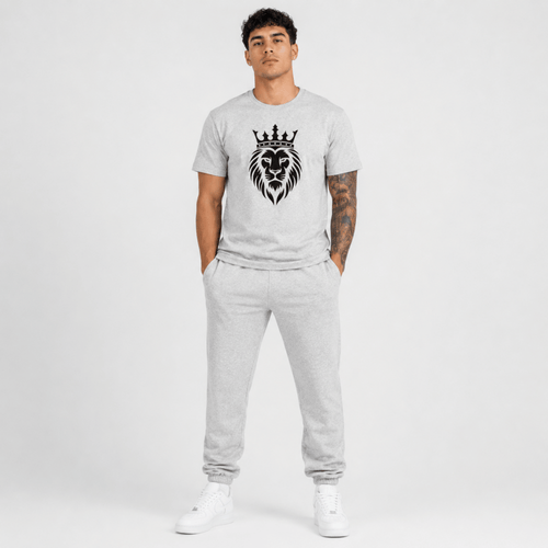 Male fashion model wearing a heather grey Sterling Antonio cotton jersey t-shirt featuring a black crowned lion graphic with matching grey sweatpants and white sneakers