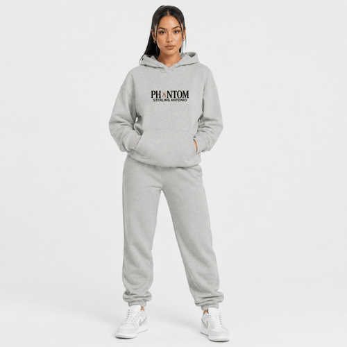 Person wearing a gray hoodie and pants with 'PHANTOM' branding on a white background