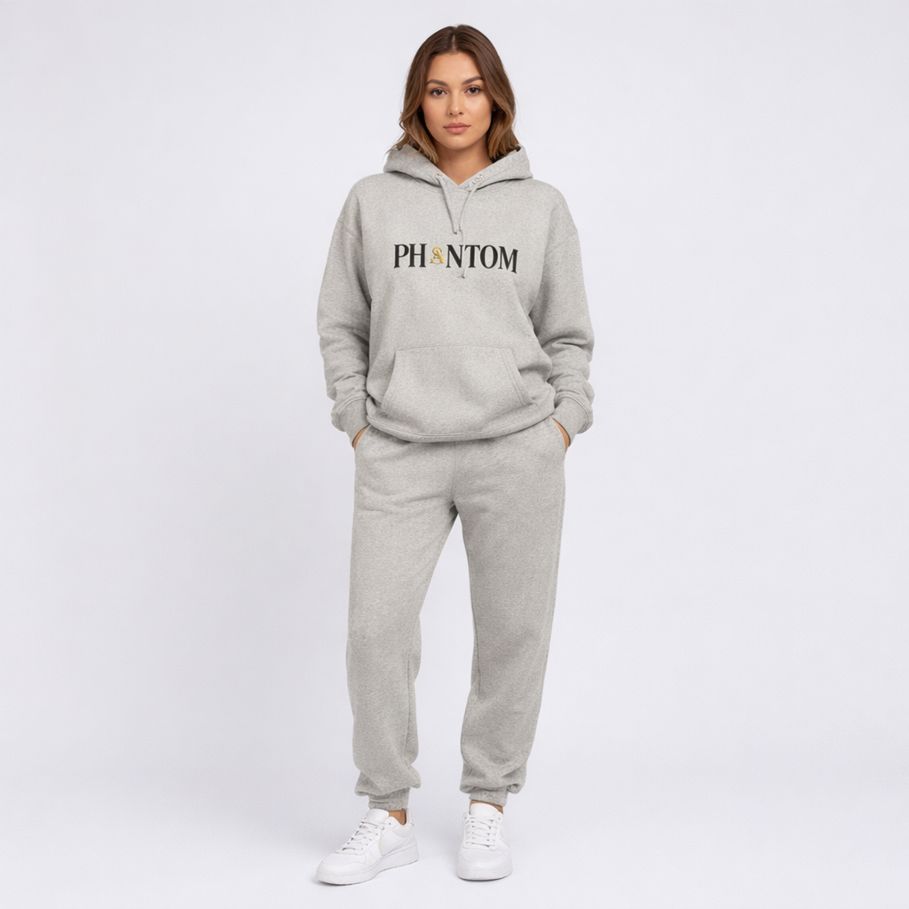 Person wearing a gray hoodie and pants with 'PHANTOM' logo on a white background