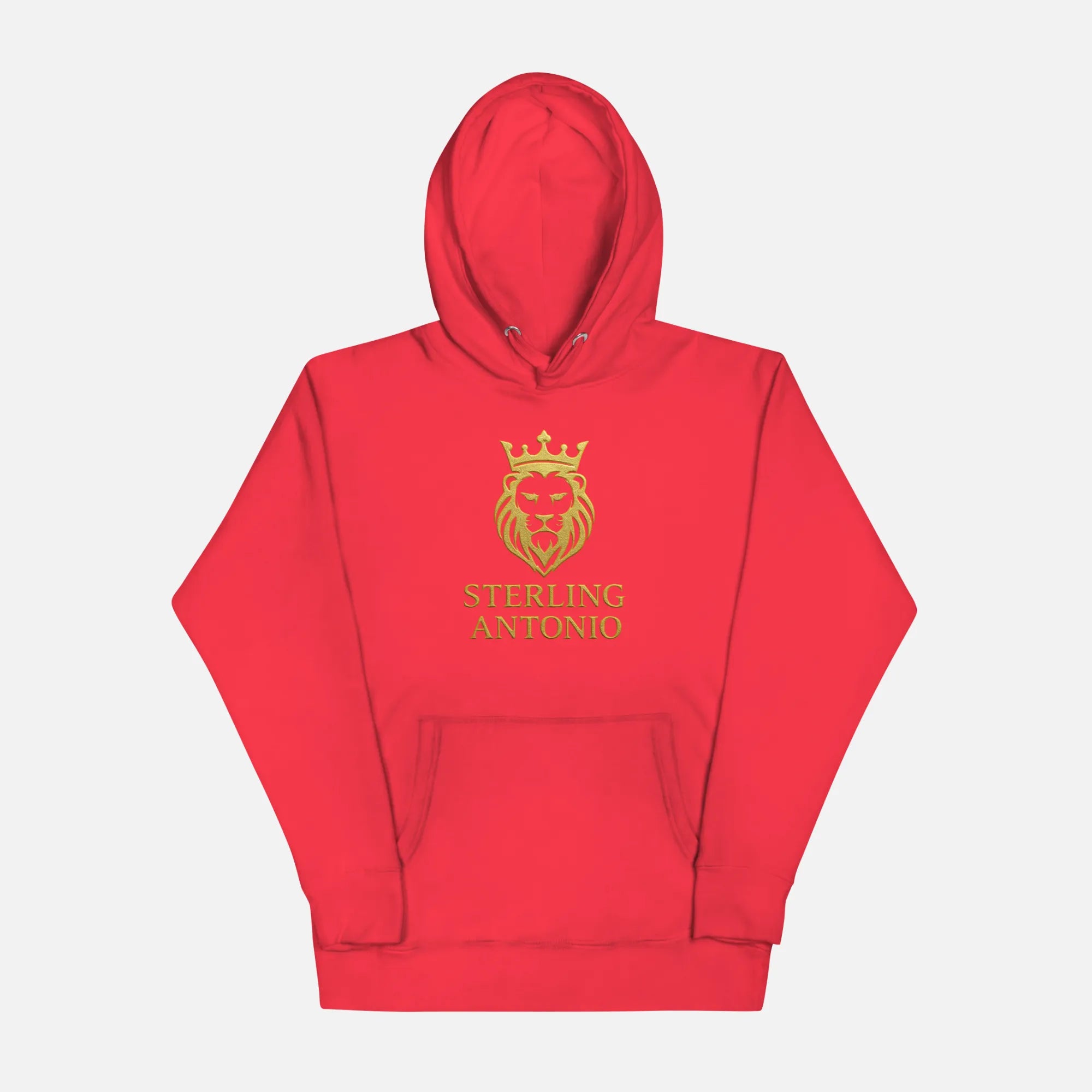 Red hoodie with gold lion emblem and text on a light gray background