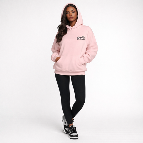 Person wearing a pink hoodie with text on a white background