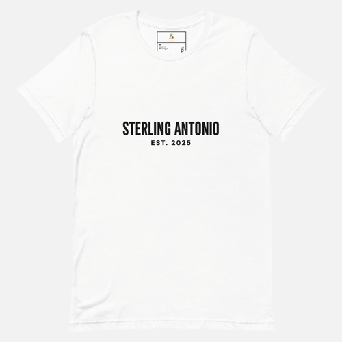 White Sterling Antonio EST. 2025 cotton jersey t-shirt with minimalist black front logo design on light grey background.