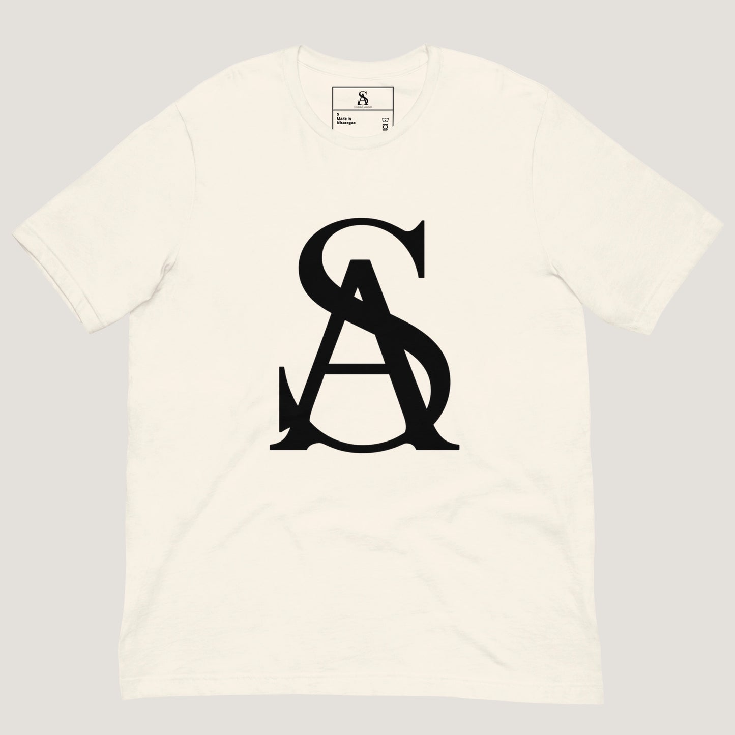 White t-shirt with black logo on a light gray background