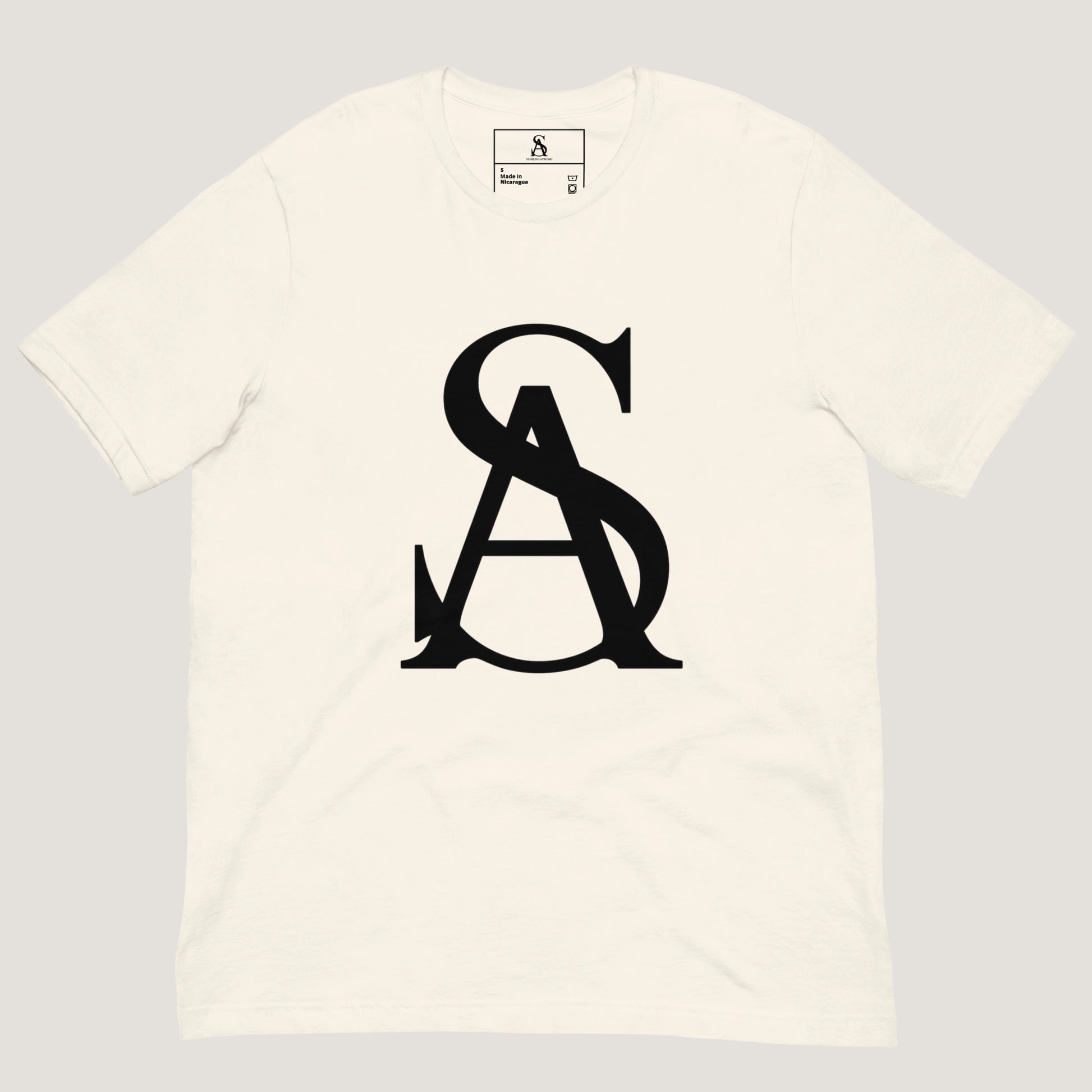 White t-shirt with black logo on a light gray background