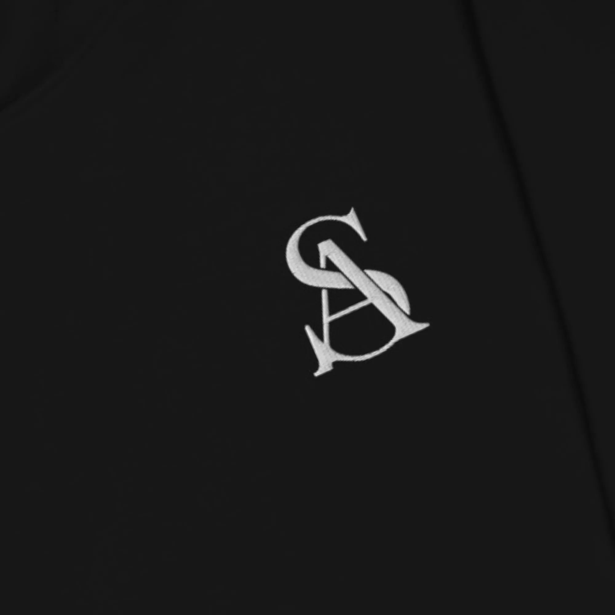 Monogram logo on a black background