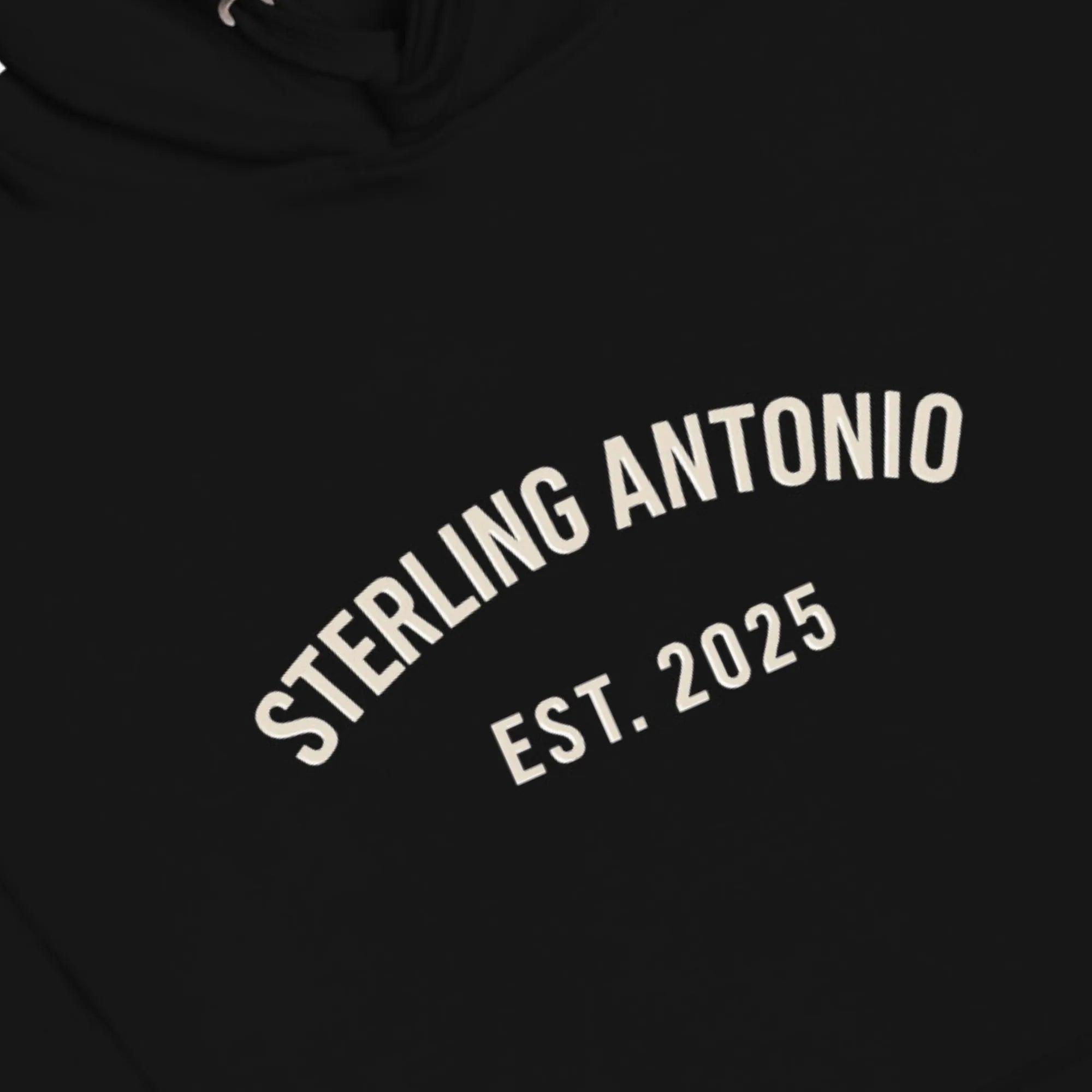 Black hoodie with 'STERLING ANTONIO EST. 2025' text in white on a black background
