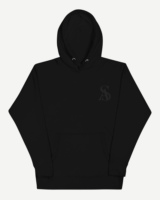 Black ring-spun cotton hoodie with a tonal black SA monogram embroidered at the chest, front pouch pocket and flat drawstrings.