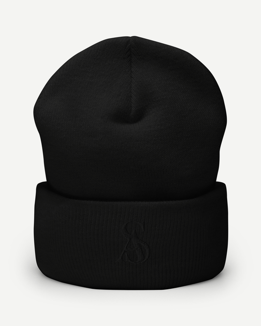 The Black Label Beanie, front view. Black cuffed knit beanie with a tonal SA monogram embroidered on the cuff.