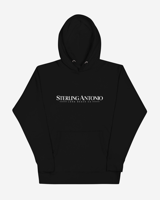 Close-up of the Sterling Antonio Long Beach, CA wordmark printed in white on the chest of the black Founders Hoodie. Sterling Antonio